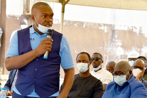 Jothan Johnson delivering a speech at the opening of the Stroke Ward in Sierra Leone